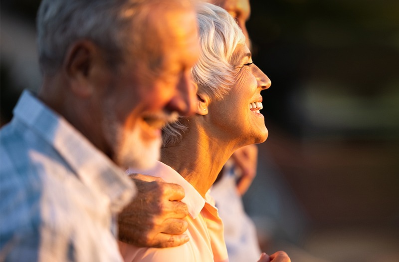 homepage-row2 woman smiling in the sun